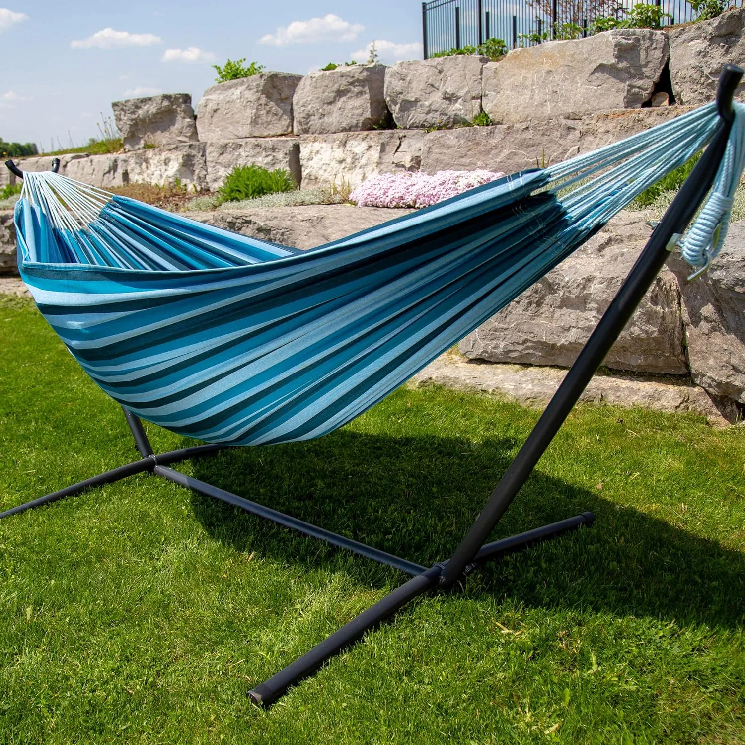 Vivere Double Cotton Hammock with Space Saving Steel Stand, Upgraded Polyester End Strings 450 lb Capacity - Premium Carry Bag Included - USA Grown Cotton (Blue Lagoon)